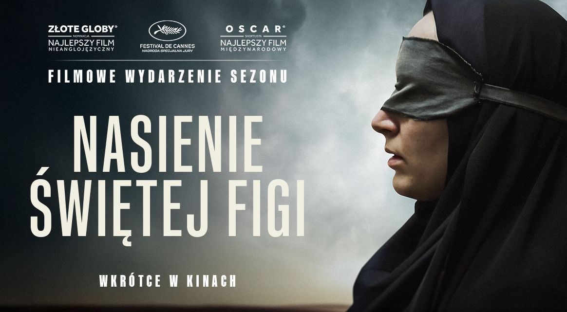 kobiet w burce z profilu na tle zachmurzonego nieba. Na dole biały napis nasienie świętej figi